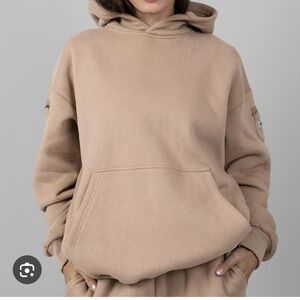 Unisex Comfrt Travel Hoodie In Color Latte